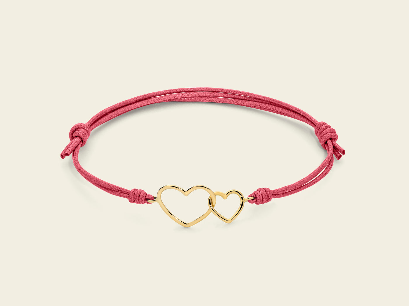 Bracciale cordino con cuori intrecciati